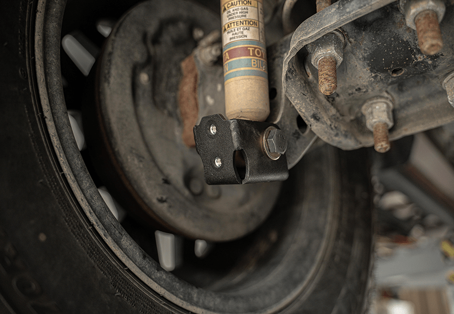 Cali Raised LED Rock Sliders/Armor Rear Shock Skid Plate For 2005-2023 Toyota Tacoma