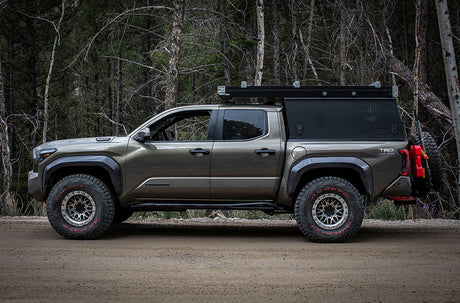 Side shot of 4th gen tacoma with peak suspension installed 